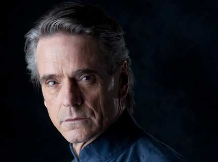 Photo of Jeremy Irons against a black background