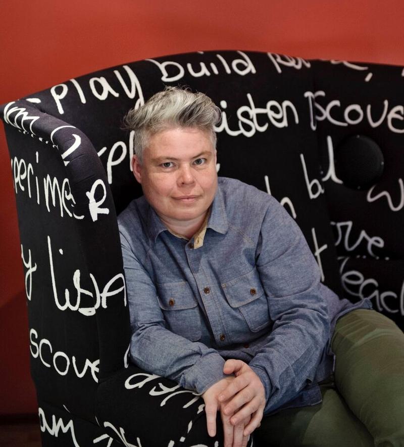 Photograph of Louise Wallwein sitting in chair